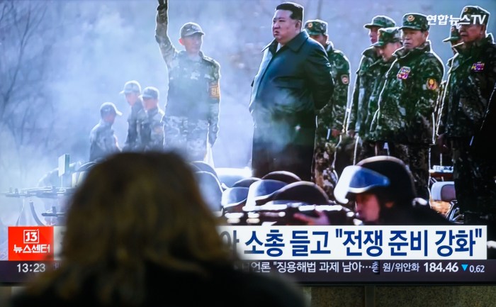 North koreas kim jong un leads meeting strengthening military inspects artillery