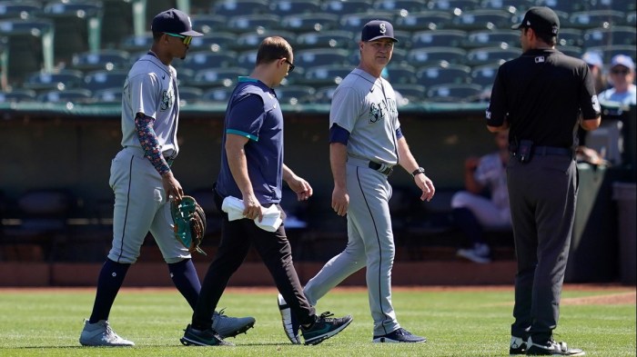 Mariners CF Julio Rodríguez departs with back tightness | king5.com With julio rodriguez limbo mariners aim halt skid vs angels